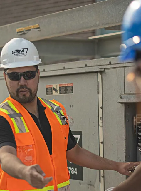 SRM workers hooking up generators