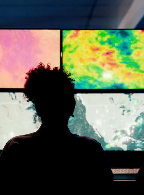 Workers in weather data center